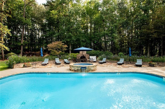 outdoor pool featuring a patio