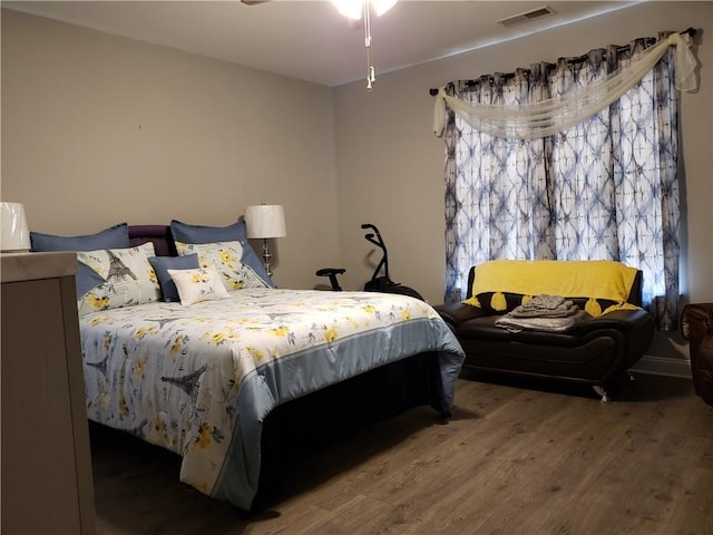 bedroom featuring hardwood / wood-style floors