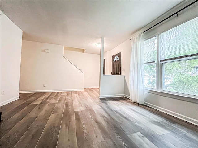 3150 Stratford Green Pl, Avondale Estates, GA 30002 - unfurnished living room with wood finished floors and baseboards