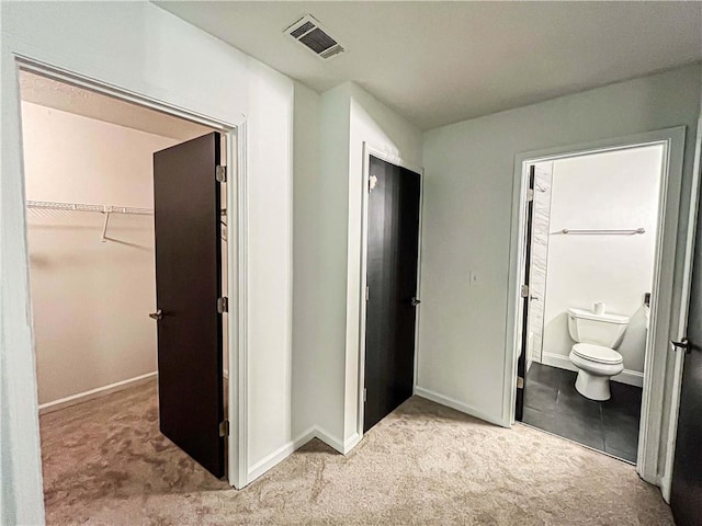3150 Stratford Green Pl, Avondale Estates, GA 30002 - unfurnished bedroom featuring carpet flooring, a spacious closet, a closet, and ensuite bath