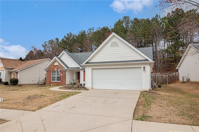 single story home with an attached garage, brick siding, fence, concrete driveway, and a front lawn