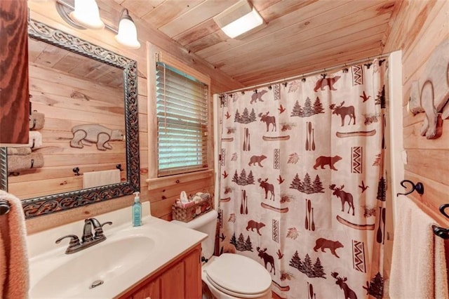 bathroom featuring vanity, wood walls, toilet, and wood ceiling