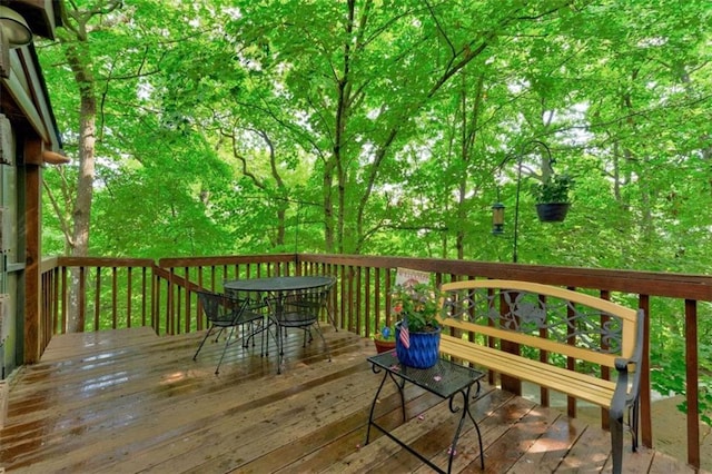 652 Fox Run Dr, Blue Ridge, GA 30513 - wooden terrace with outdoor dining space