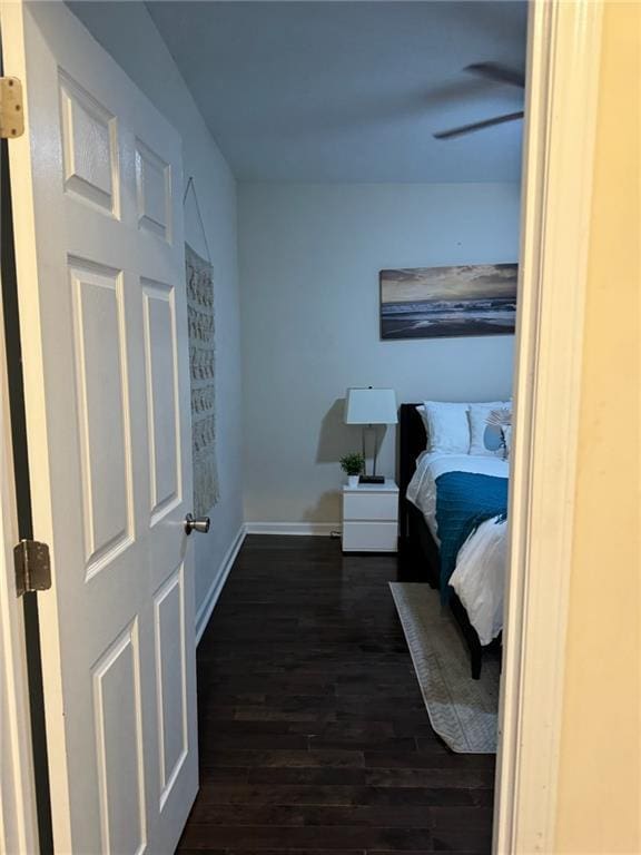 bedroom featuring dark hardwood / wood-style flooring