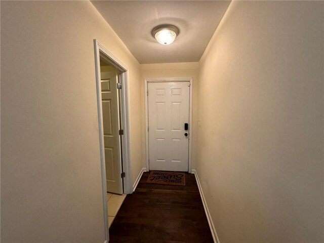 bedroom featuring dark hardwood / wood-style floors and ceiling fan