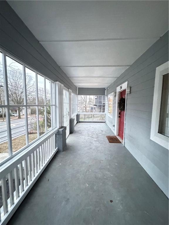 bedroom with dark hardwood / wood-style floors