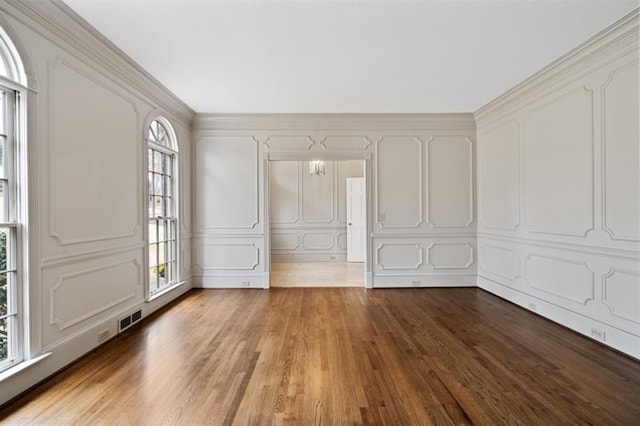 1585 Lazy River Ln, Sandy Springs, GA 30350 - interior space with visible vents, wood finished floors, and a decorative wall