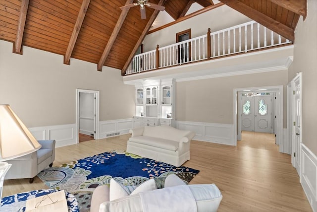 1585 Lazy River Ln, Sandy Springs, GA 30350 - living area with ceiling fan, wooden ceiling, beam ceiling, a decorative wall, and high vaulted ceiling