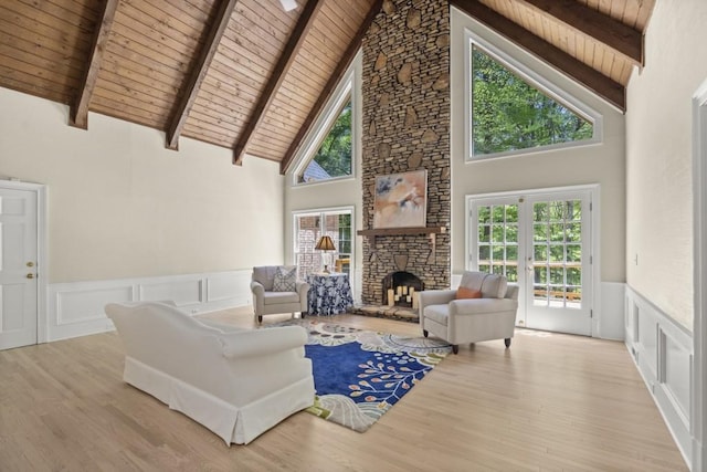 1585 Lazy River Ln, Sandy Springs, GA 30350 - living area with wood ceiling, beamed ceiling, a decorative wall, wood finished floors, and high vaulted ceiling