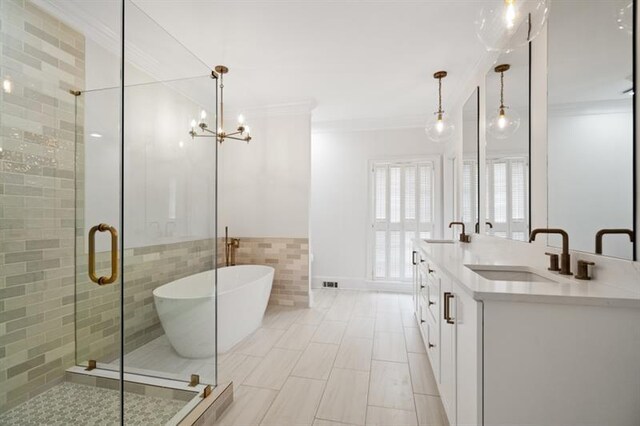 1585 Lazy River Ln, Sandy Springs, GA 30350 - full bath featuring a freestanding tub, crown molding, a stall shower, and a sink