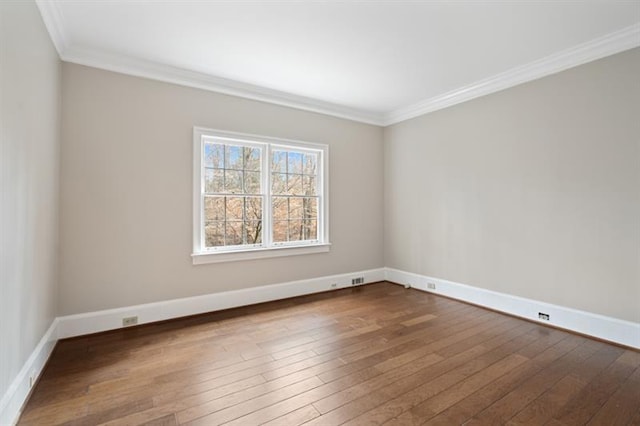 1585 Lazy River Ln, Sandy Springs, GA 30350 - spare room with crown molding, baseboards, and wood-type flooring