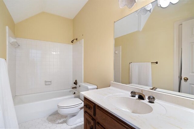 1585 Lazy River Ln, Sandy Springs, GA 30350 - full bath featuring lofted ceiling, shower / bath combo, toilet, tile patterned floors, and vanity