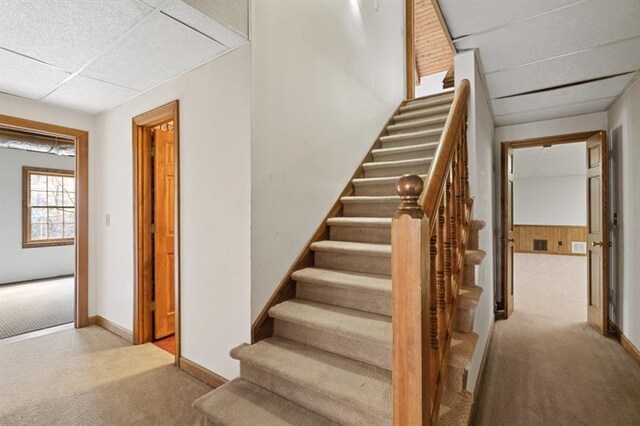 1585 Lazy River Ln, Sandy Springs, GA 30350 - stairway featuring a drop ceiling, carpet, and baseboards