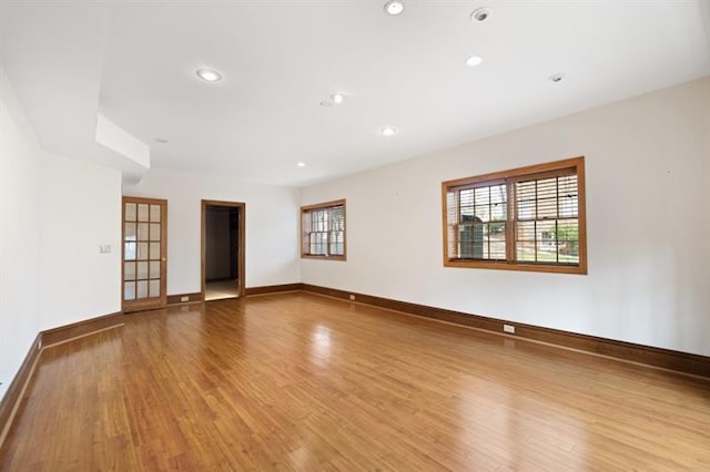 1585 Lazy River Ln, Sandy Springs, GA 30350 - spare room featuring light wood-type flooring, recessed lighting, and baseboards