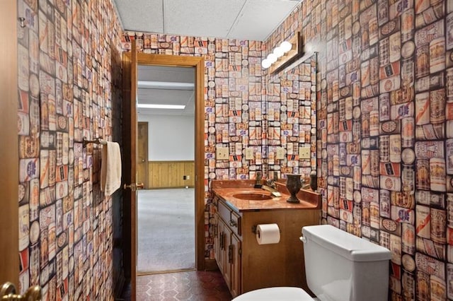 1585 Lazy River Ln, Sandy Springs, GA 30350 - half bathroom with toilet, a wainscoted wall, vanity, and a textured ceiling
