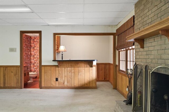1585 Lazy River Ln, Sandy Springs, GA 30350 - interior space with wainscoting, wooden walls, light colored carpet, and a paneled ceiling