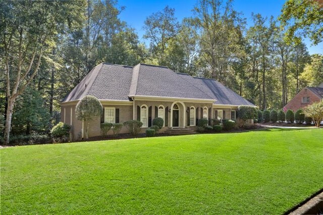 1585 Lazy River Ln, Sandy Springs, GA 30350 - ranch-style home featuring a front lawn