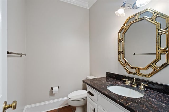 1585 Lazy River Ln, Sandy Springs, GA 30350 - half bath with vanity, tile patterned floors, toilet, crown molding, and baseboards