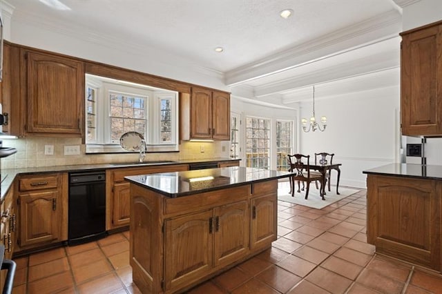 1585 Lazy River Ln, Sandy Springs, GA 30350 - kitchen featuring tile patterned floors, a kitchen island, dark countertops, backsplash, and a notable chandelier