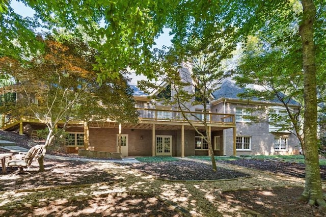 1585 Lazy River Ln, Sandy Springs, GA 30350 - back of property featuring a deck and french doors