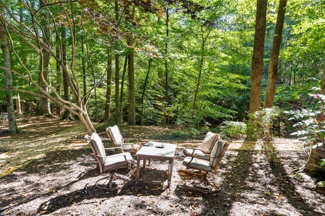 1585 Lazy River Ln, Sandy Springs, GA 30350 - view of yard featuring a wooded view