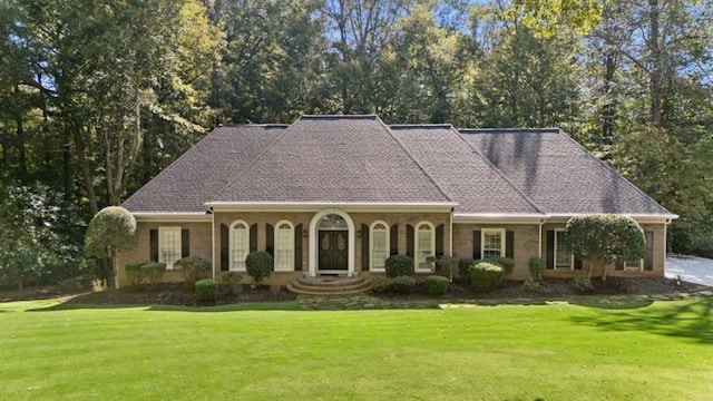 1585 Lazy River Ln, Sandy Springs, GA 30350 - view of front of house with a front yard