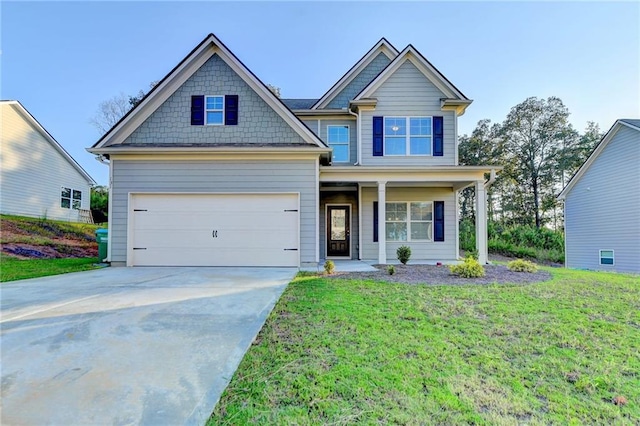 craftsman-style house with a garage and a front yard