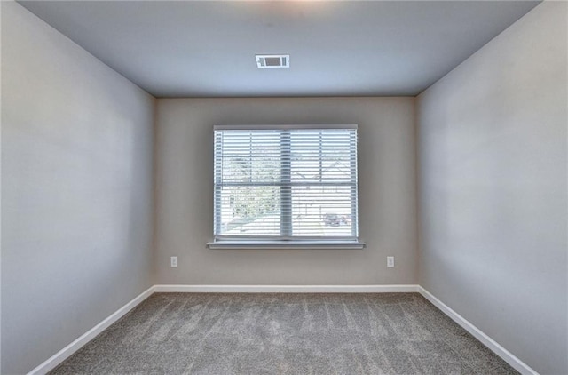 spare room with carpet flooring