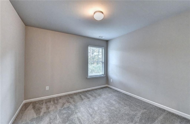 unfurnished room with carpet