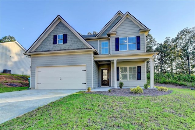 craftsman-style home featuring central air condition unit, a garage, and a front lawn