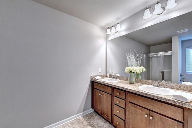 bathroom featuring walk in shower and vanity