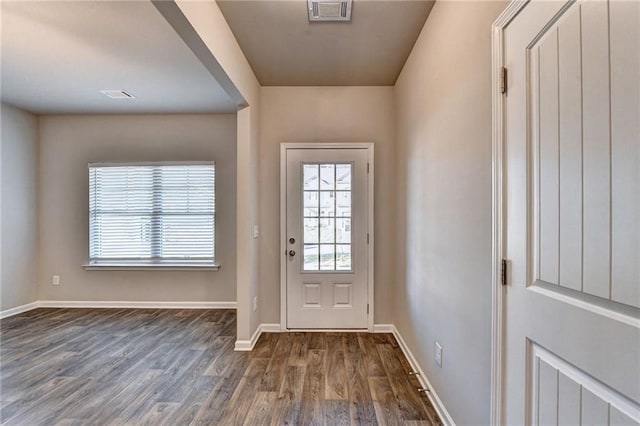 doorway to outside featuring dark hardwood / wood-style floors