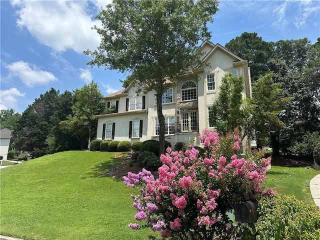600 Oakmont Hl, Duluth, GA 30097 - view of front of property with stucco siding and a front lawn