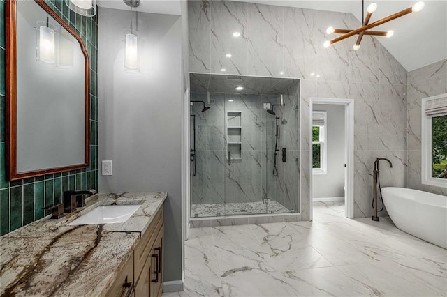 600 Oakmont Hl, Duluth, GA 30097 - full bath featuring marble tiled flooring, vanity, a marble finish shower, a freestanding bath, and lofted ceiling