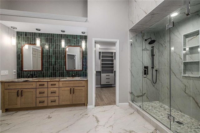 600 Oakmont Hl, Duluth, GA 30097 - bathroom with a marble finish shower, double vanity, marble finish flooring, a spacious closet, and a high ceiling