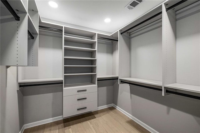 600 Oakmont Hl, Duluth, GA 30097 - walk in closet with light wood finished floors