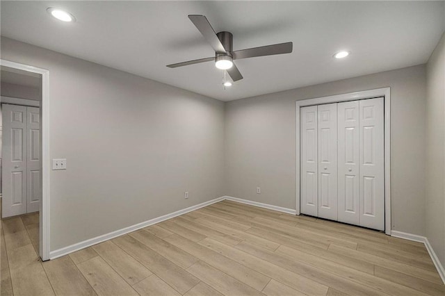 600 Oakmont Hl, Duluth, GA 30097 - unfurnished bedroom with light wood-style floors, recessed lighting, a ceiling fan, and a closet