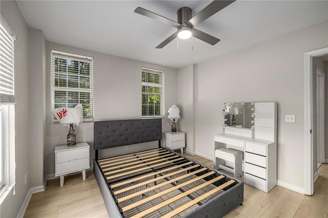 600 Oakmont Hl, Duluth, GA 30097 - bedroom featuring light wood-style floors and ceiling fan