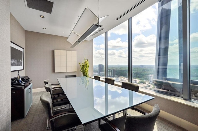 dining area featuring expansive windows
