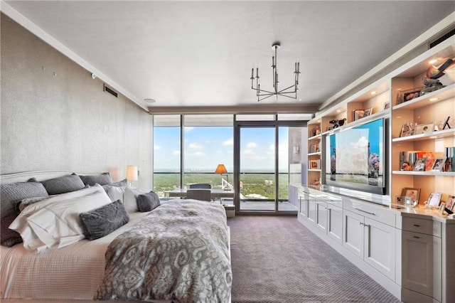 bedroom featuring access to outside, floor to ceiling windows, and dark carpet