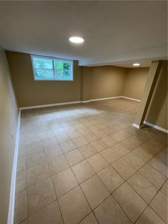 6399 Boca Grande Blvd, Forest Park, GA 30297 - basement with recessed lighting, light tile patterned flooring, and baseboards