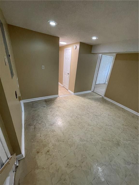 6399 Boca Grande Blvd, Forest Park, GA 30297 - finished basement with recessed lighting, baseboards, a textured ceiling, and light floors
