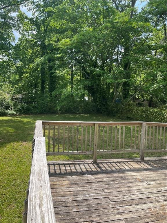 6399 Boca Grande Blvd, Forest Park, GA 30297 - deck featuring a lawn