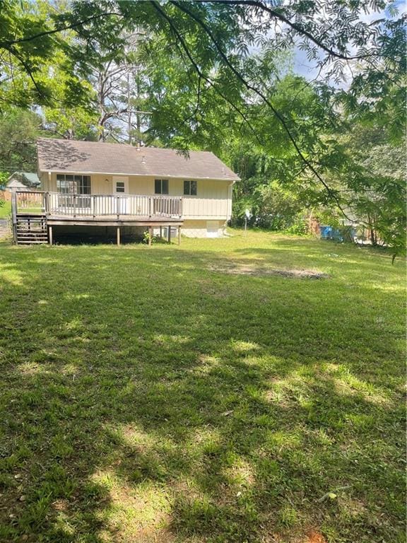 6399 Boca Grande Blvd, Forest Park, GA 30297 - view of green lawn featuring a deck