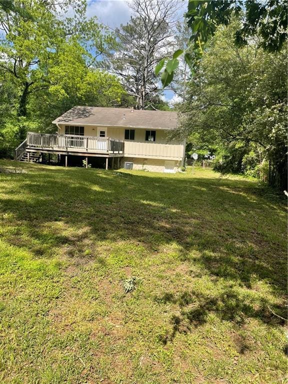 6399 Boca Grande Blvd, Forest Park, GA 30297 - view of grassy yard with a wooden deck