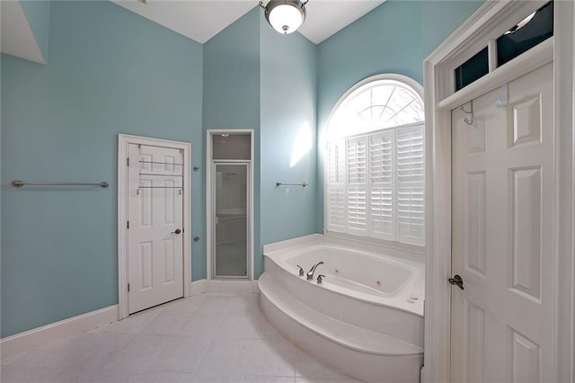 bathroom featuring tile patterned floors and plus walk in shower