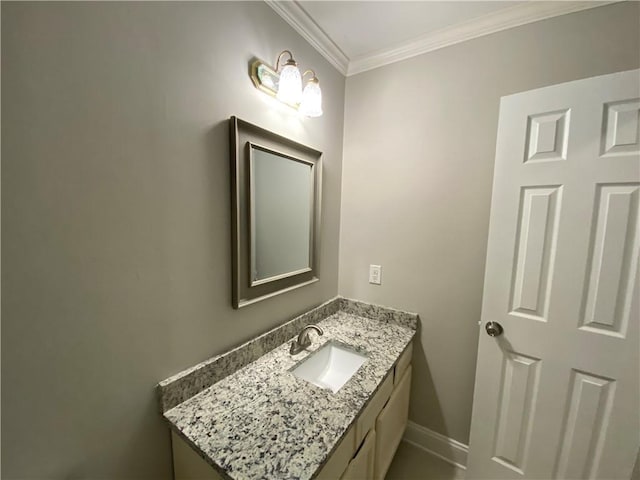 bathroom featuring vanity and crown molding