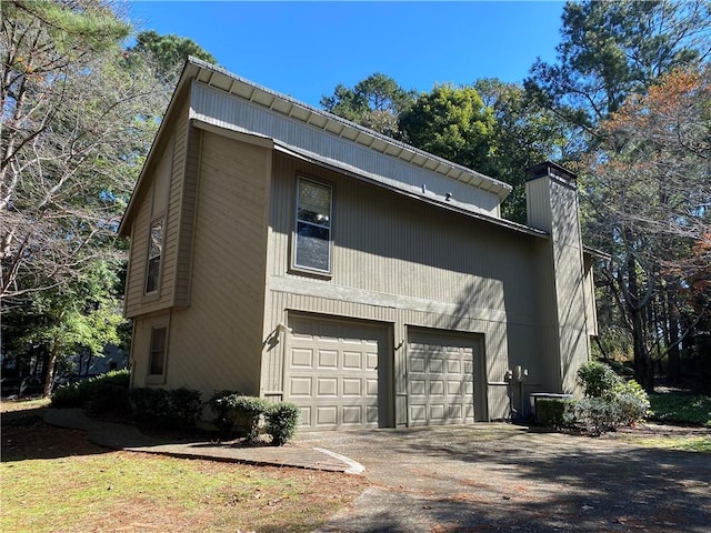 view of property exterior featuring a garage