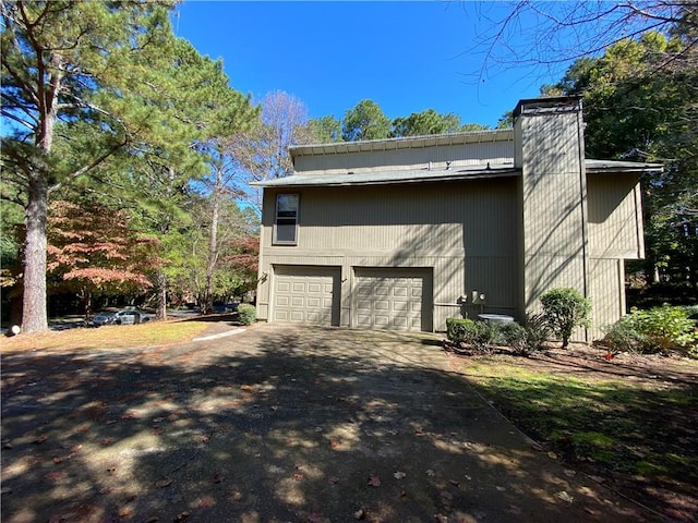 view of home's exterior featuring a garage