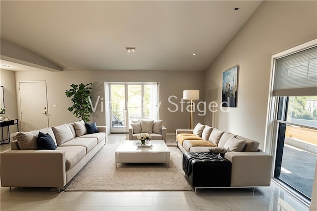 living room featuring lofted ceiling